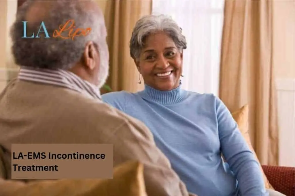 Couple sat smiling at each other - LA-EMS treatment Greater London (Harrow)