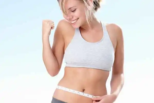 woman happy after fat reduction treatment Greater London (Harrow)